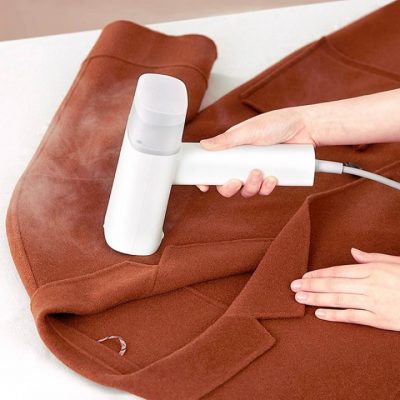 bàn ủi hơi nước cầm tay có thể sử dụng trên mọi chất liệu vải